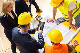 Reviewing project plans on site